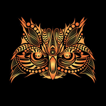 Patterned Golden head of the owl. African / indian / totem / tattoo design. It may be used for design of a t-shirt, bag, postcard and poster.