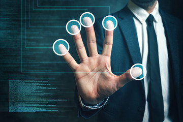 Businessman passing biometric verification with fingerprint scan