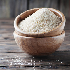 Brown sugar on the wooden table