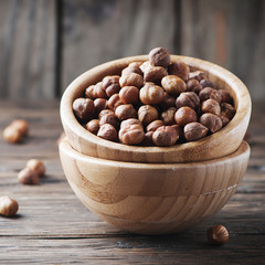 Raw hazelnut on the wooden table