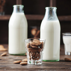 Almond milk on the wooden table