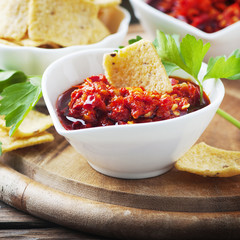 Hot mexican salsa with chili peppers