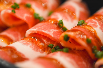 Slide raw pork . Close up