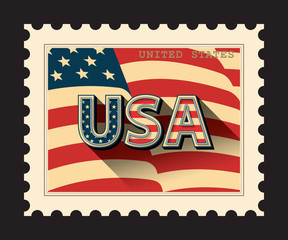 USA - postage stamp with American flag background. Isolated on black.