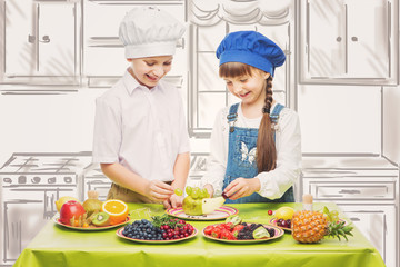 Obraz na płótnie Canvas Children making fruit snacks