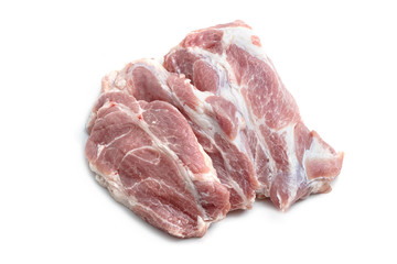 Raw pork meat steaks on the white background.