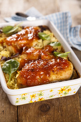 Baked chicken with rice and mango glaze