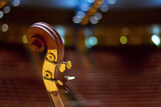 Contrabass on stage in front of an empty hall
