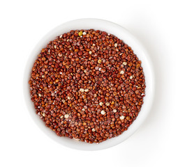 Bowl of red quinoa isolated on white, from above
