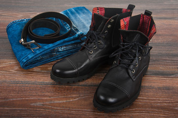 Men's shoes, jeans and a belt