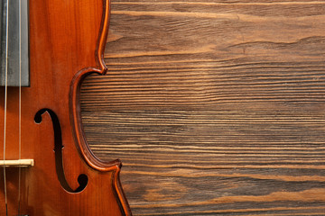 Violin on wooden background