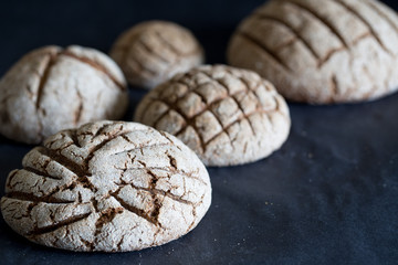 black bread on black table close-up