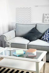 Living room interior with sofa and table