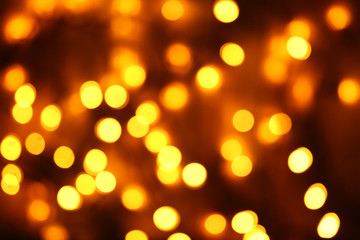 Obraz premium Electric Christmas garland on wooden background