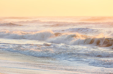 Ocean Wave at Sunrise at Chincoteague National Wildlife Refugee, Virginia, USA.