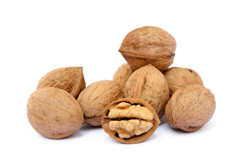 Fresh walnut with a shell isolated on white background