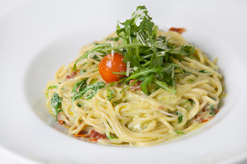 Pasta with arugula and parmesan