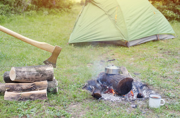 Camping in the woods on the banks of the river. 