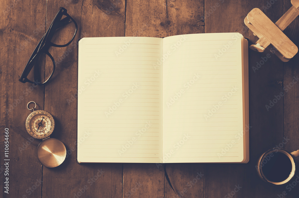Poster open notebook with blank pages on wooden table
