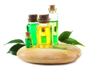 Bottles of tea oil, isolated on white
