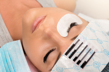 Obraz na płótnie Canvas Procedure of eyelashes extension
