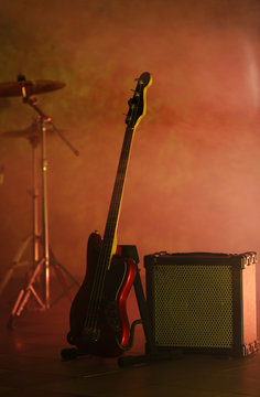 Rock band instruments on foggy background