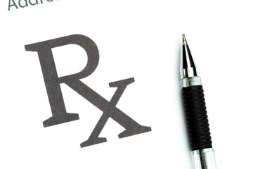 Empty medical prescription with a pen