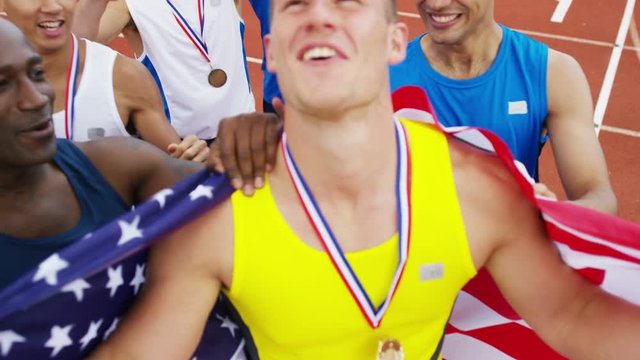  USA athletics team (disabled & able bodied) celebrate a victory