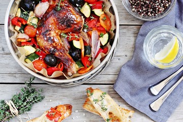 Roasted chicken leg with seasonal vegetables . Healthy eating concept.Selective focus 