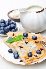 Homemade  poppy seed traditional pancakes with cream cheese and