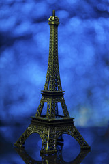 Fototapeta na wymiar Eiffel tower shot in studio with bokeh lights in backgound