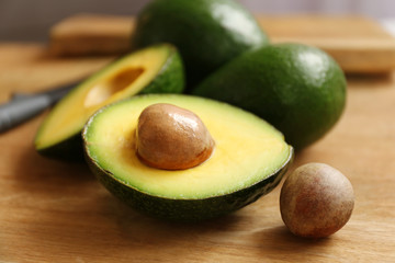 Fresh avocado on a table, closeup © Africa Studio