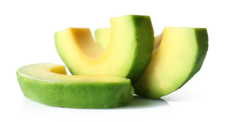 Pieces of avocado isolated on white