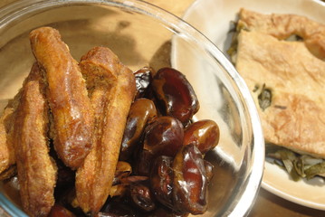 dried bananas and dates, pie with sorrel, vegetarian food. Selective focus