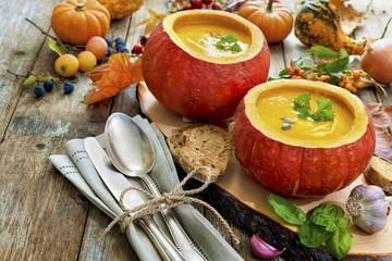 Pumpkin soup on a wooden table