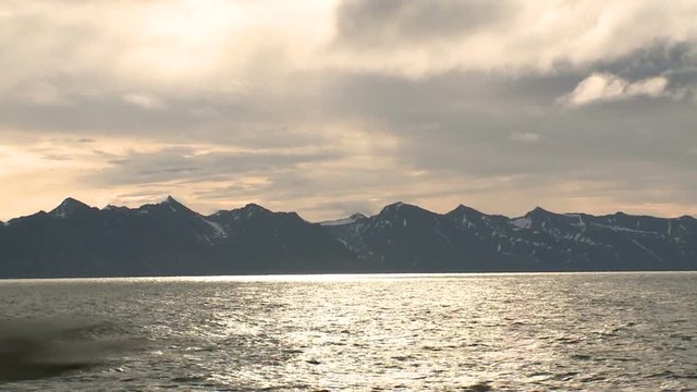 View to Svalbard with floating vessel