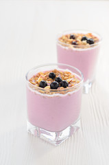 Berry milk smoothie with oat flakes