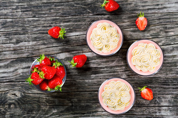 Strawberry Cheesecake Mousse Cups decorated by homemade ice crea