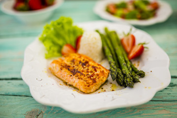 Salmon, asparagus with fresh strawberries, light diet
