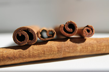 Four cinnamon sticks in the fifth from the end, daylight