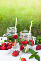 Cold drink with mint and strawberry