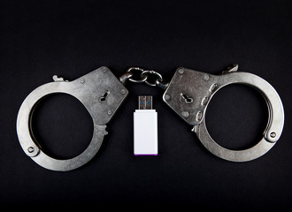 Handcuffs and USB Drive