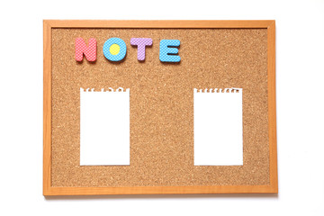 Corkboard with paper and wording note on white background