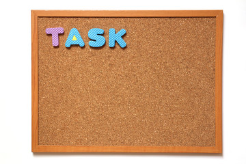 Corkboard with wording task placed on white background