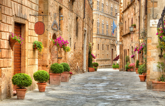 Fototapeta Colorful street in Pienza, Tuscany, Italy