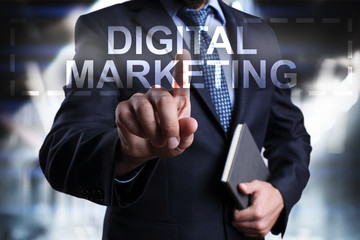 Businessman is pressing on the virtual screen and selecting Digital marketing.
