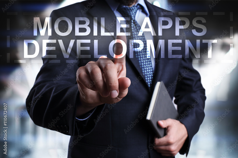Poster businessman is pressing on the virtual screen and selecting mobile apps development.
