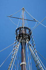 detail of crow nest and rigging ropes in replica of ancient boat caravel of Christopher Columbus when discovered America in 1492, docked at harbor Palos de la Frontera, Huelva, Andalusia, Spain
