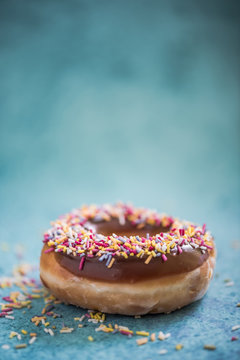Artisan donut with colorful sprinkles