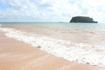 clearly sea water wave beach with blue sky on relax and vacation time